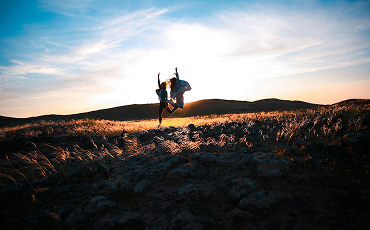 People jumping with happiness 